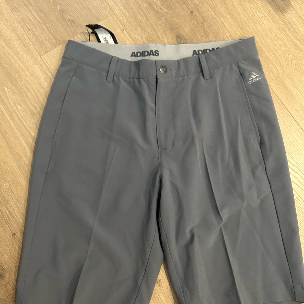 Dark gray men’s adidas golf shorts